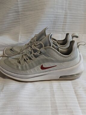 Nike Men's Light Gray Athletic Sneakers with Red Swoosh